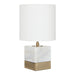 Marble based table lamp with brass accents